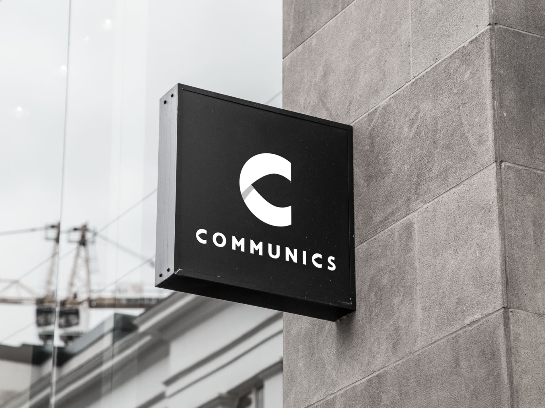 Communics signing aan buitenmuur