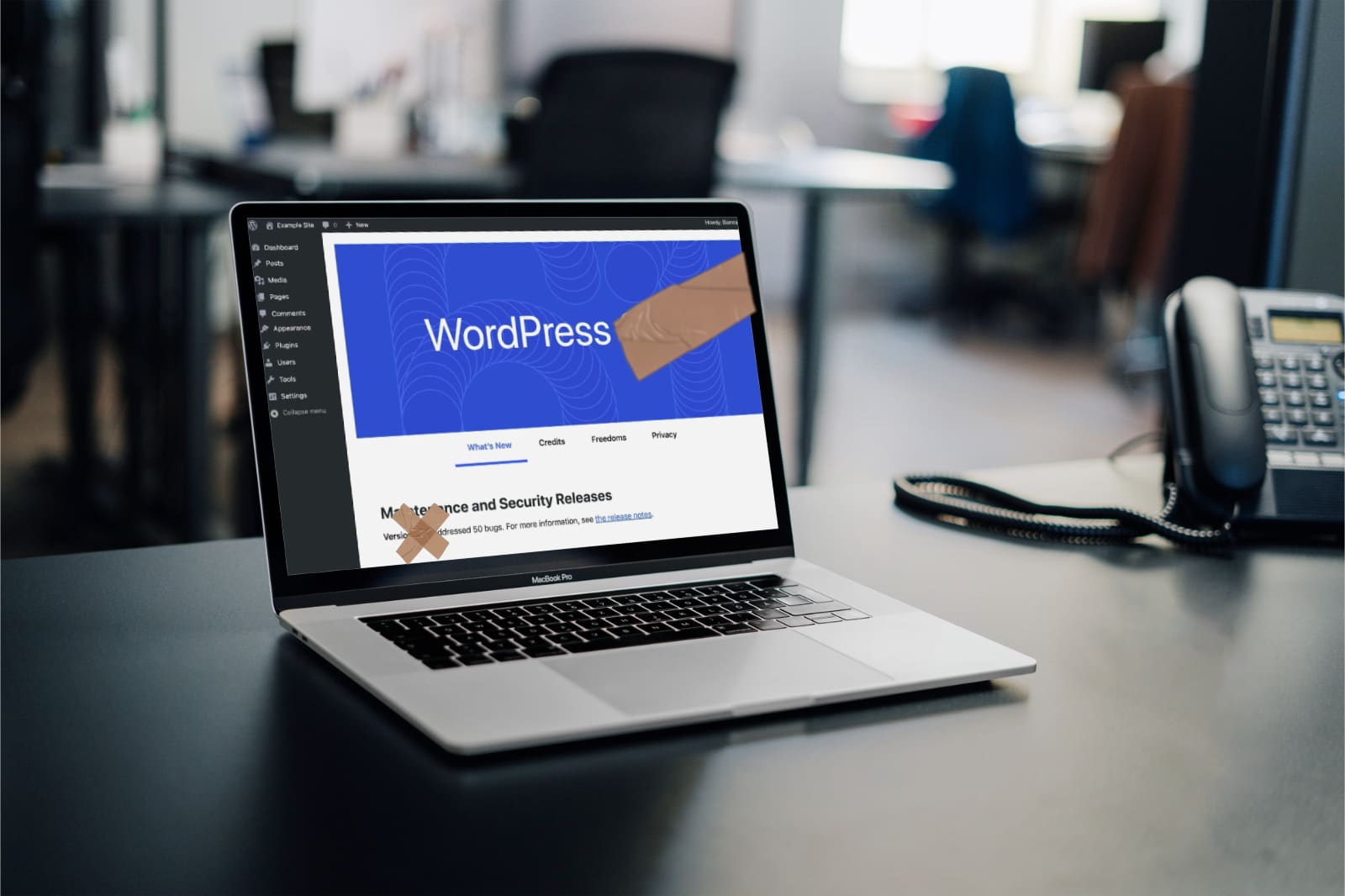 laptop met WordPress welkom scherm met afgeplakte versie d.m.v. tape.